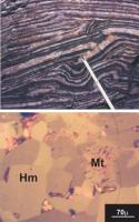 Figura 2 - a) Itabirito caracterizado pela alternância de bandas de quartzo e óxido de ferro; b) fotomicrografia de minério compacto constituído por cristais de hematita (Hm), com relictos de martita (Mt) compondo uma trama granoblástica. Fotos compiladas de Rosière et al. (2009).